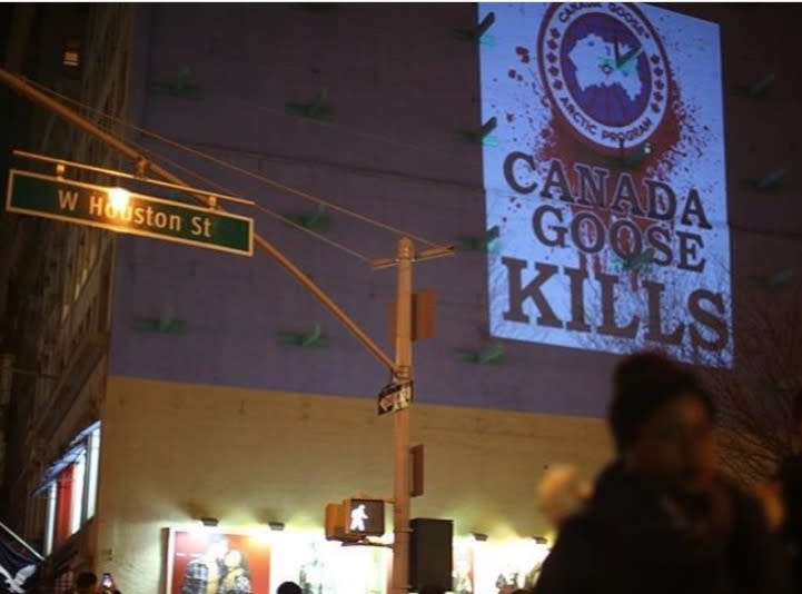 A projection is cast on Houston Street in SoHo, Manhattan, close to the Canada Goose flagship store. (Photo: Courtesy of Rob Banks) 