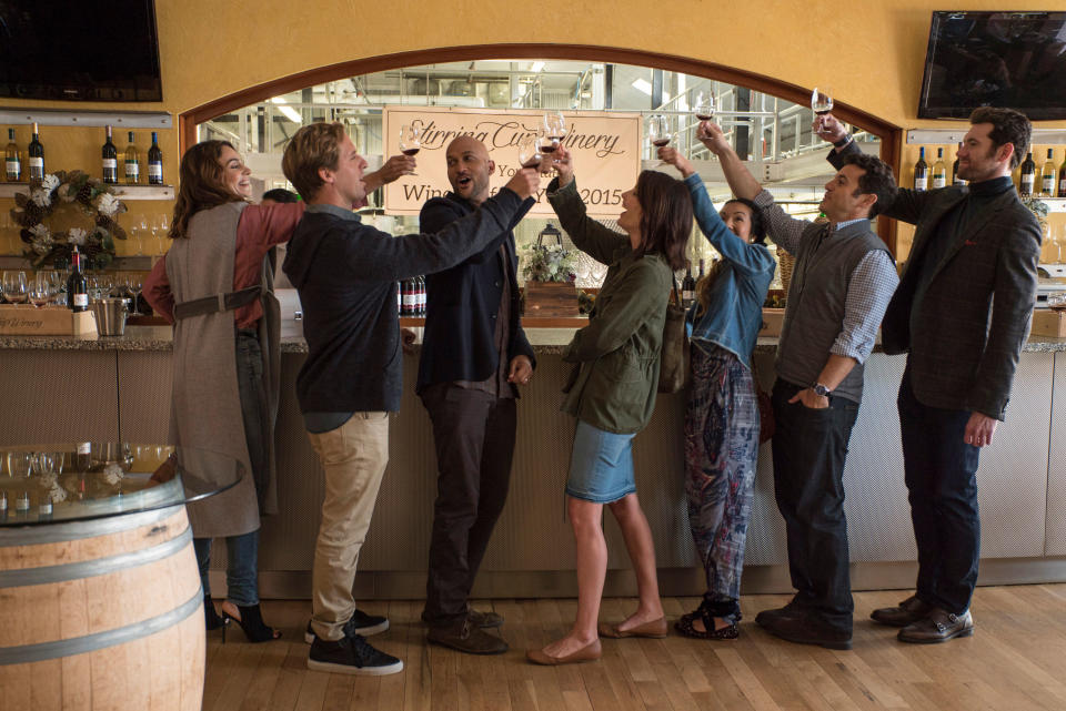 People raising their glasses in a toast