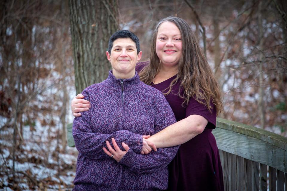 Kelly Newman, right, and her wife Rachel struggled with the strain of juggling work and the remote education as well as child care for their six children during the pandemic. Kelly quit her job in July.