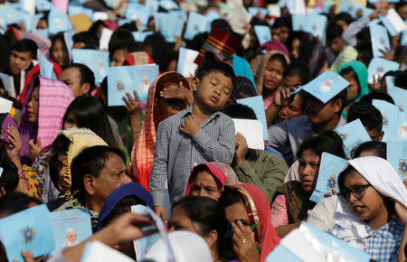 Believers attend a mass by Pope Francis in Dhaka, Bangladesh December 1, 2017. REUTERS/Max Rossi