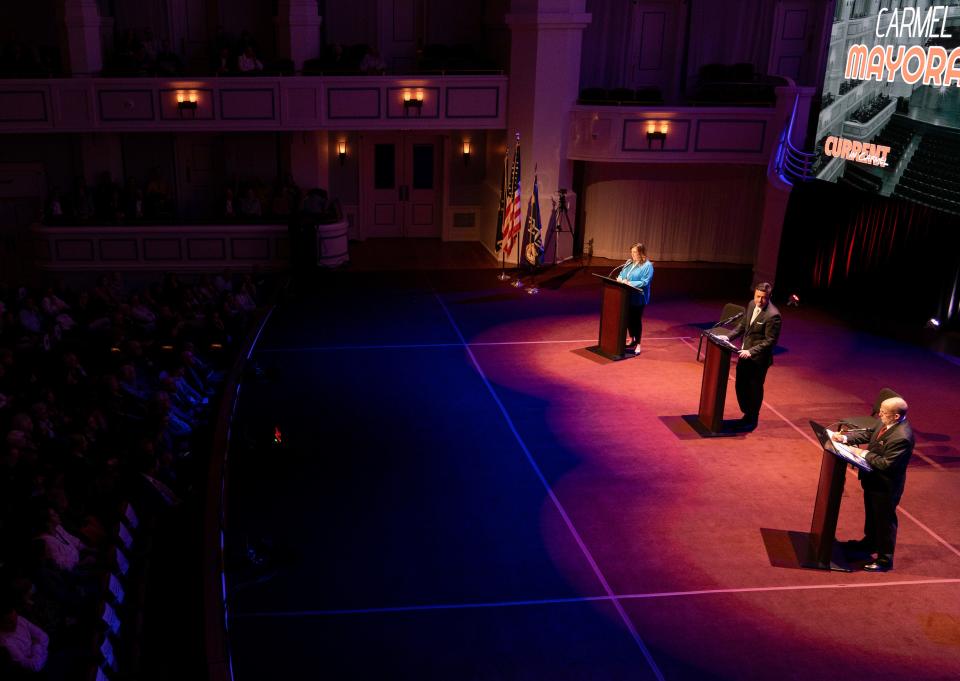 From left, Sue Finkam, Fred Glynn and Kevin Rider take part in the Republican mayoral debate Tuesday, March 28, 2023, at The Palladium in Carmel, Ind. The primary election will be held May 2.