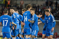 Italy's Matteo Pessina, right, celebrates with his teammates after scoring his side's second goal during the Euro 2024 group C qualifying soccer match between Malta and Italy at the National stadium in Ta' Qali, near Valletta, Malta, Sunday, March 26, 2023. (AP Photo/Rene Rossignaud)
