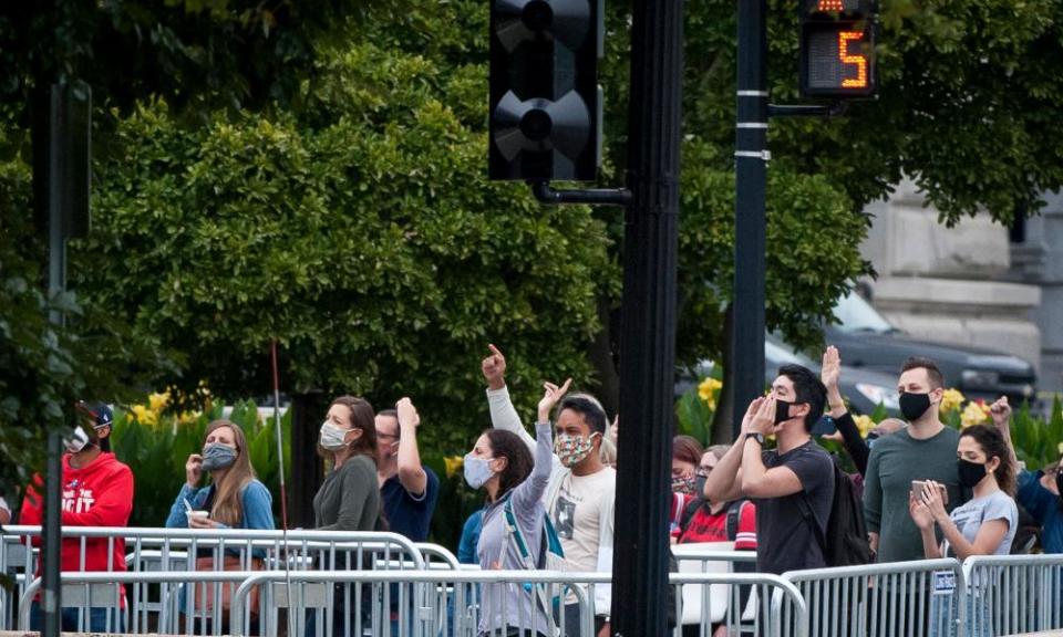 The crowd booed the president from the bottom of the steps.