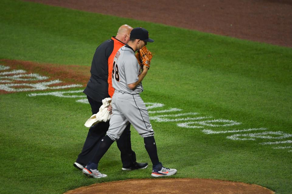 Matthew Boyd #48 of the Detroit Tigers leaves the game in the second inning after an apparent injury against the Chicago White Sox in Game 2 at Guaranteed Rate Field in Chicago on Thursday, April 29, 2021.