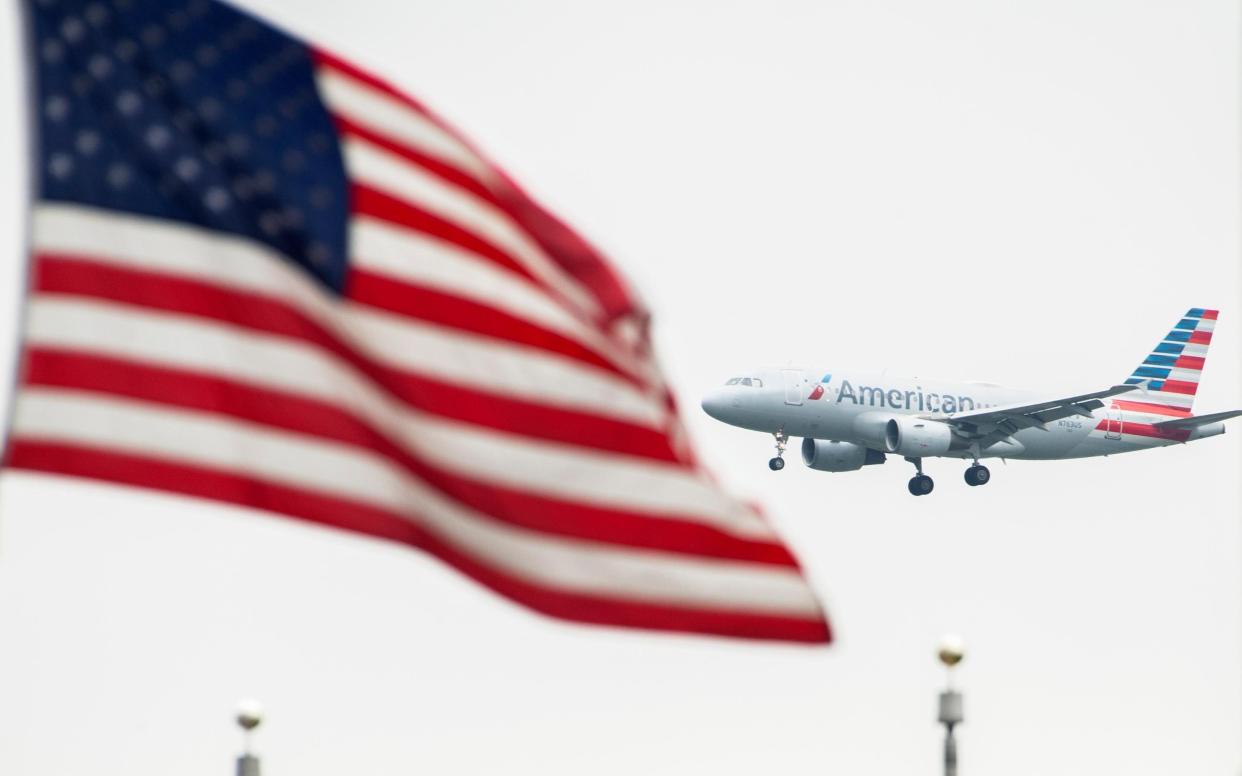 An American Airlines jet landing in Washington - Getty