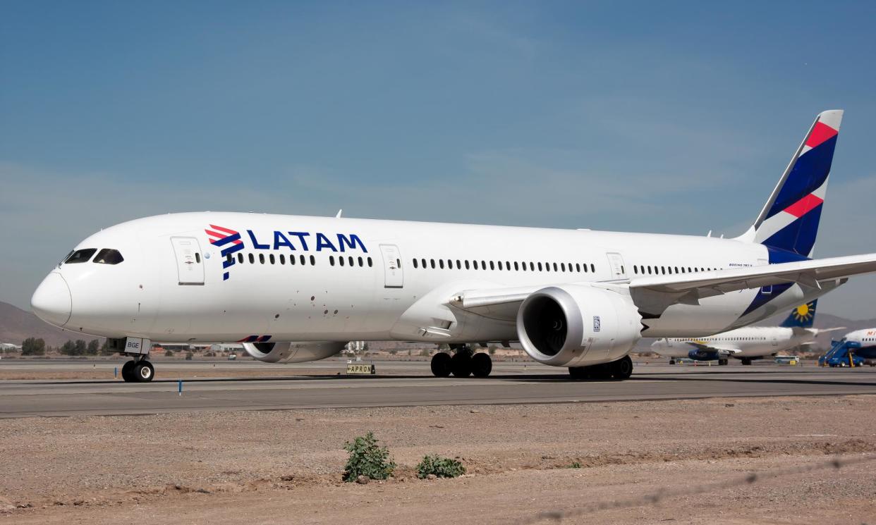 <span>A Latam Boeing 787-9 Dreamliner. Emergency services at Auckland airport treated about 50 people after a Latam plane experienced a ‘mid-air drop’.</span><span>Photograph: SOPA Images/LightRocket/Getty Images</span>