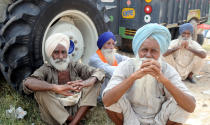 Farmers during the protest against the Electricity Amendment Bill 2020 and agriculture reforms bills passed in the Parliament, at NH-7 Delhi-Amritsar Highway, at Shambhu Border, on September 25, 2020 in Patiala, India. The two bills - the Farmers (Empowerment and Protection) Agreement on Price Assurance and Farm Services Bill, 2020 and the Farming Produce Trade and Commerce (Promotion and Facilitation) Bill, 2020 - were passed by the Rajya Sabha despite uproar and strong protest by the Opposition parties in the house. (Photo by Bharat Bhushan/Hindustan Times via Getty Images)