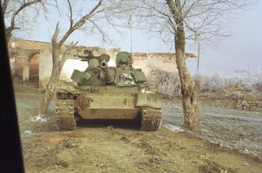 A Serbian tank in January 1999 in Kosovo's northern Podujevo region, as Serb forces advanced toward positions of ethnic Albanian guerillas