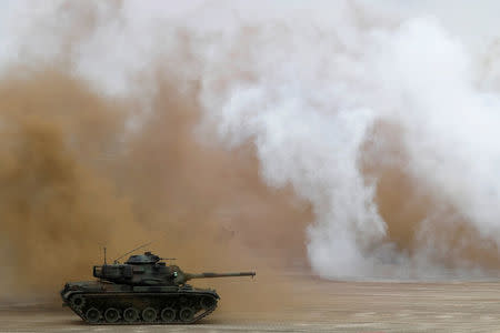 A M60A3 tank takes part in Han Kuang military drill simulating the China's People's Liberation Army (PLA) invading the island, at Ching Chuan Kang Air Base, in Taichung, Taiwan June 7, 2018. REUTERS/Tyrone Siu