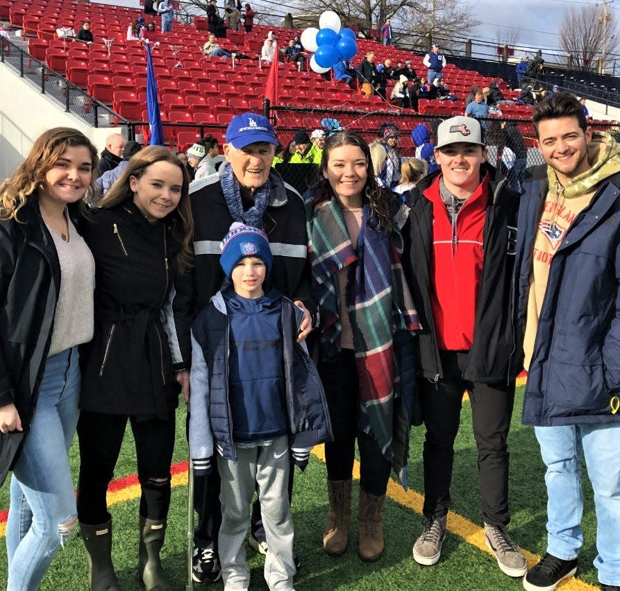 Lloyd Hill Sr. with his grandchildren on Nov. 28, 2019, at Veterans Memorial Stadium in Quincy. From left, Laura, Kristina, Lloyd Sr. with Brice in front, Kate Lynne, Lloyd and Laurence.