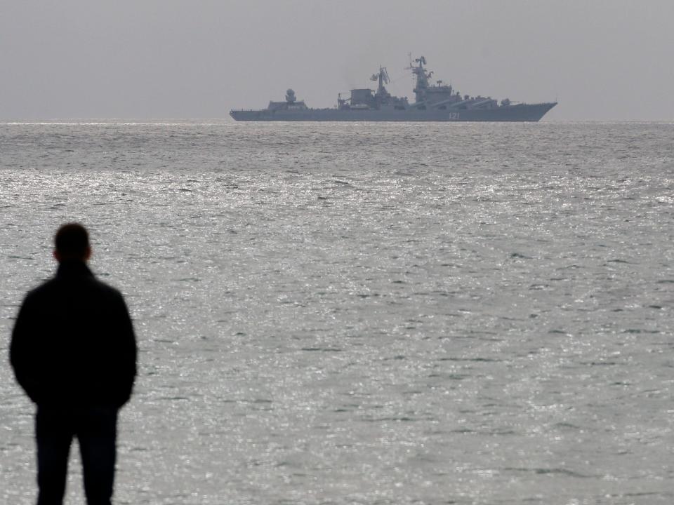 The Russian warship "Moskva" ("Moscow"), a Slava class guided missile cruiser, off the Black Sea shore in 2014.