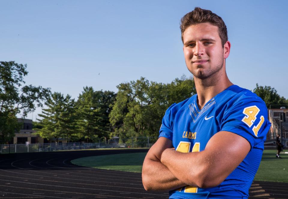 Carmel defensive end Beau Robbins will have his hands full against Warren Central on Friday.