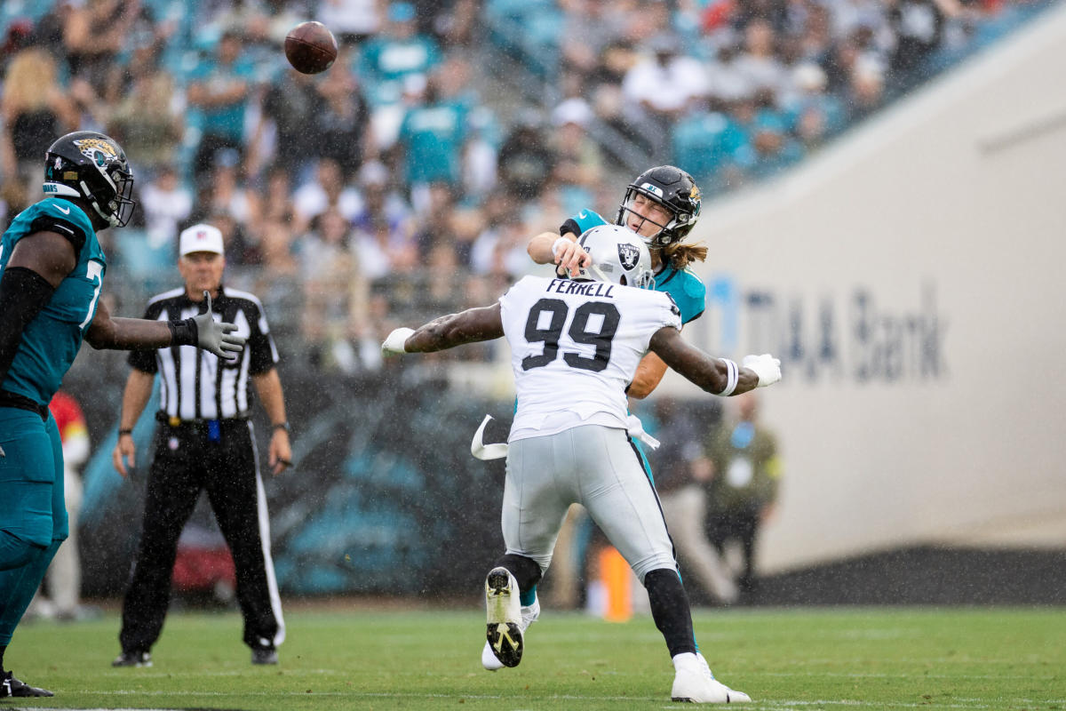 Raiders defensive end Clelin Ferrell (99) celebrates a sack with Raiders  defensive end Solomon …