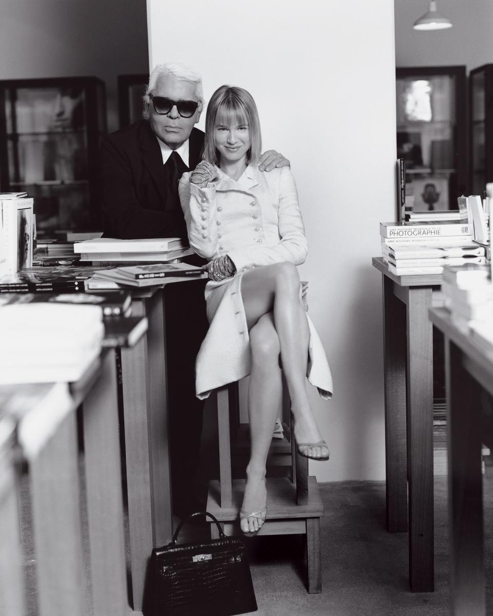 Renée Zellweger, in Chanel Haute Couture, with Karl Lagerfeld at his Paris bookstore, 7L.