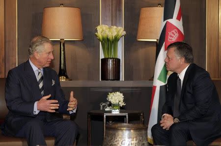 Jordan's King Abdullah (R) meets with Britain's Prince Charles in Amman, February 8, 2015. REUTERS/Khalil Mazrawi/Pool