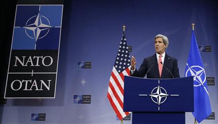 U.S. Secretary of State John Kerry addresses a news conference during a NATO foreign ministers meeting at the Alliance headquarters in Brussels December 3, 2013. REUTERS/Francois Lenoir