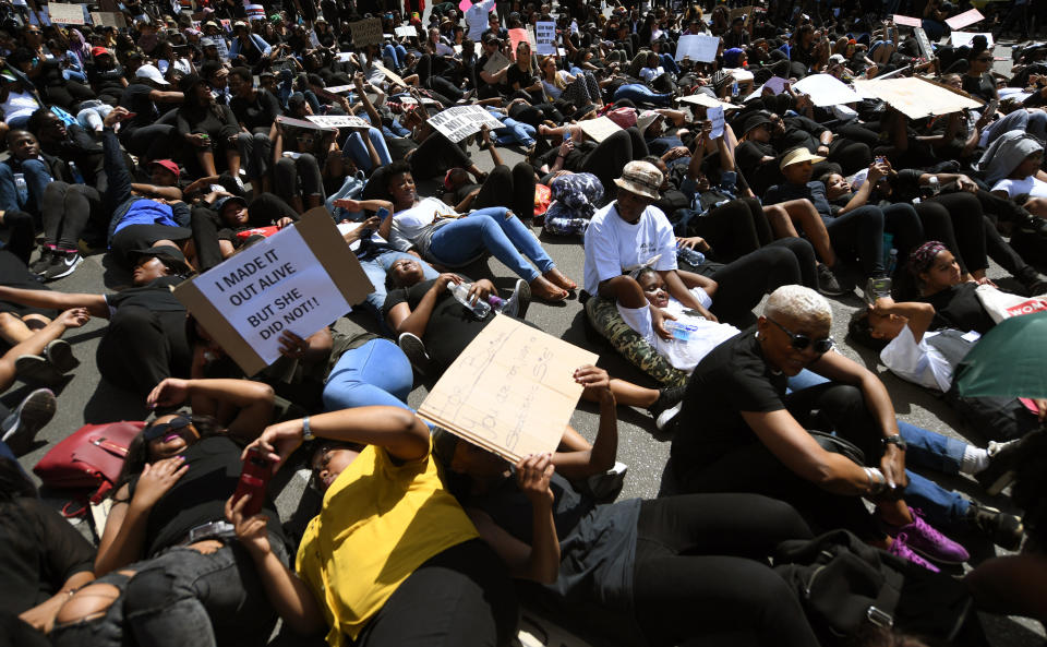 Demonstrators protest against gender based violence in Sandton, Johannesburg Friday, Sept. 13, 2019. The protesters are calling on President Cyril Ramaphosa to declare a state of emergency, a day after the country's latest crime statistics were released. (AP Photo)