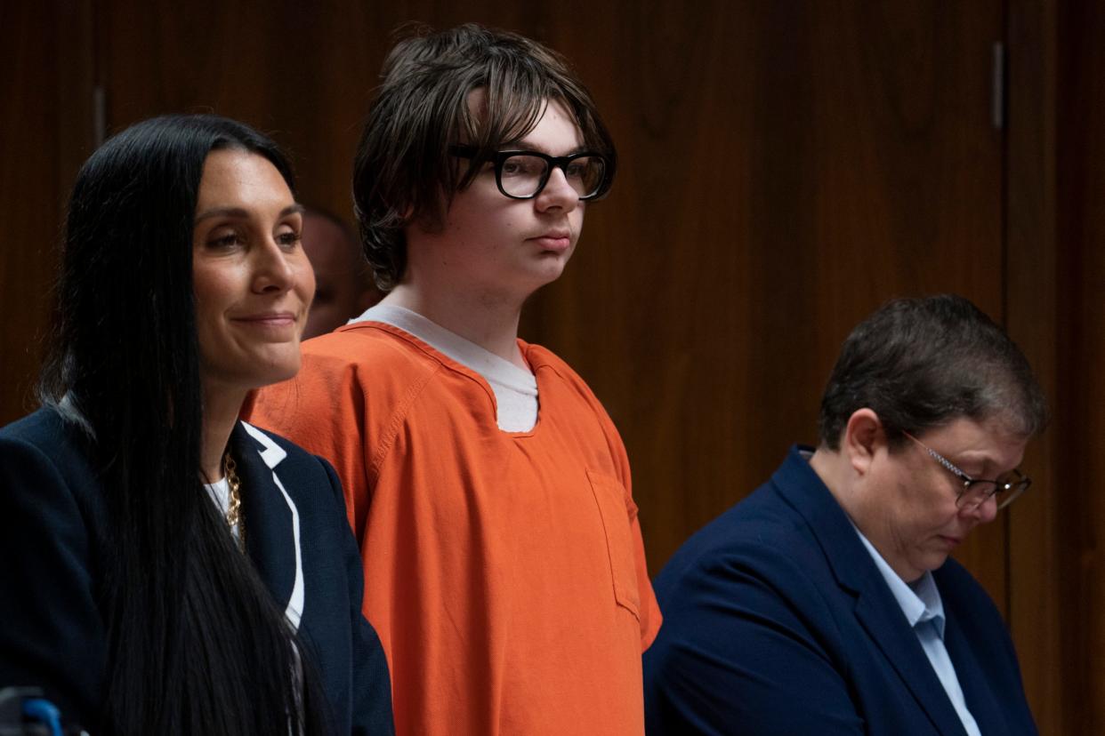 Defense attorney Paulette Michel Loftin, left, stands with Ethan Crumbley and defense attorney Amy Hopp as they appear in court, on Friday, Aug. 18, 2023, in Pontiac.