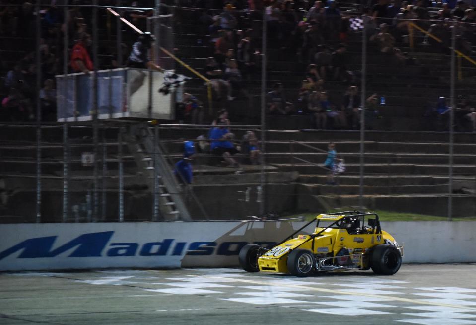 Kody Swanson takes the checkered flag at the 2019 Bytec Dairyland 100 USAC Silver Crown race at Madison International Speedway. Swanson is trying to win his seventh title this season and his third straight race at Madison on Friday.