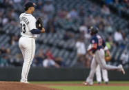 Seattle Mariners starting pitcher Justus Sheffield waits as Minnesota Twins' Nelson Cruz runs the bases after hitting a three-run home run during the fifth inning of a baseball game Wednesday, June 16, 2021, in Seattle. (AP Photo/Stephen Brashear)