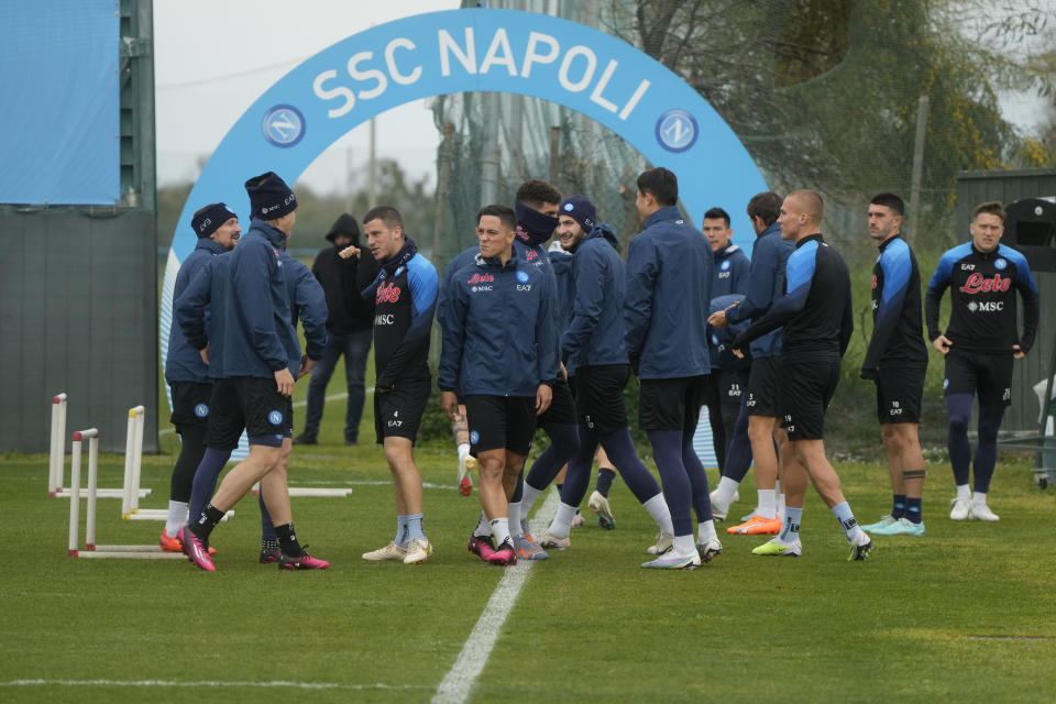 Napoli players warm up during a training session at the club headquarters in Castel Volturno, near Naples, Wednesday, April 5, 2023. Unlike other major cities in Italy, Naples has only one major soccer team and the fan support for Napoli is felt on every street and alleyway. Lobotka, who developed with Ajax’s junior squad and then played for Danish club Nordsjaelland and Spanish side Celta Vigo before transferring to Italy, had never experienced anything like Napoli. (AP Photo/Gregorio Borgia)