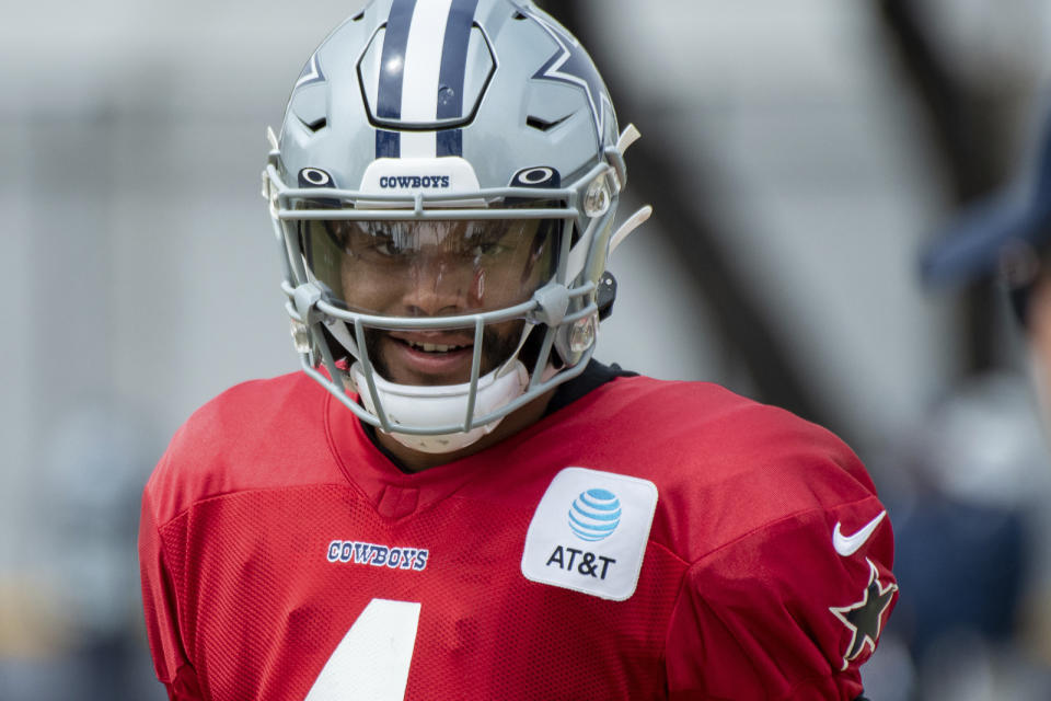 Dallas Cowboys quarterback Dak Prescott in action during practice at the NFL football team's training camp in Oxnard, Calif., Wednesday, July 28, 2021. (AP Photo/Michael Owen Baker)