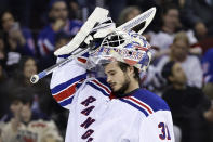 New York Rangers goaltender Igor Shesterkin reacts while skating back to his net during a break in play against the New Jersey Devils during the second period of Game 7 of an NHL hockey Stanley Cup first-round playoff series Monday, May 1, 2023, in Newark, N.J. (AP Photo/Adam Hunger)