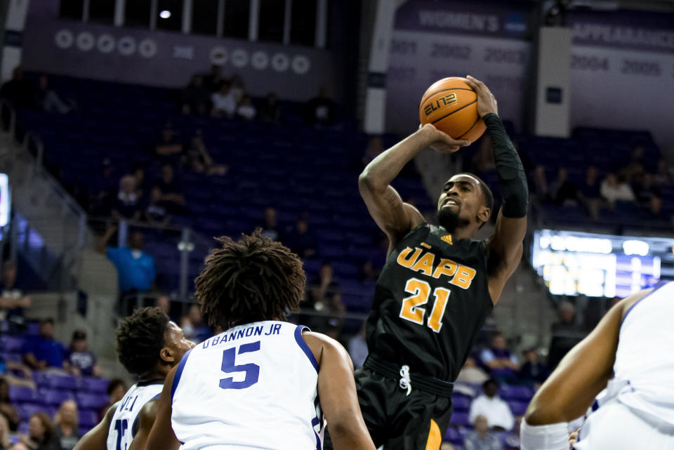 Arkansas-Pine Bluff guard Shaun Doss Jr. (21) shoots a fadeaway jump shot in the first half of an NCAA college basketball game against TCU in Fort Worth, Texas, Monday, Nov. 7, 2022. (AP Photo/Emil Lippe)