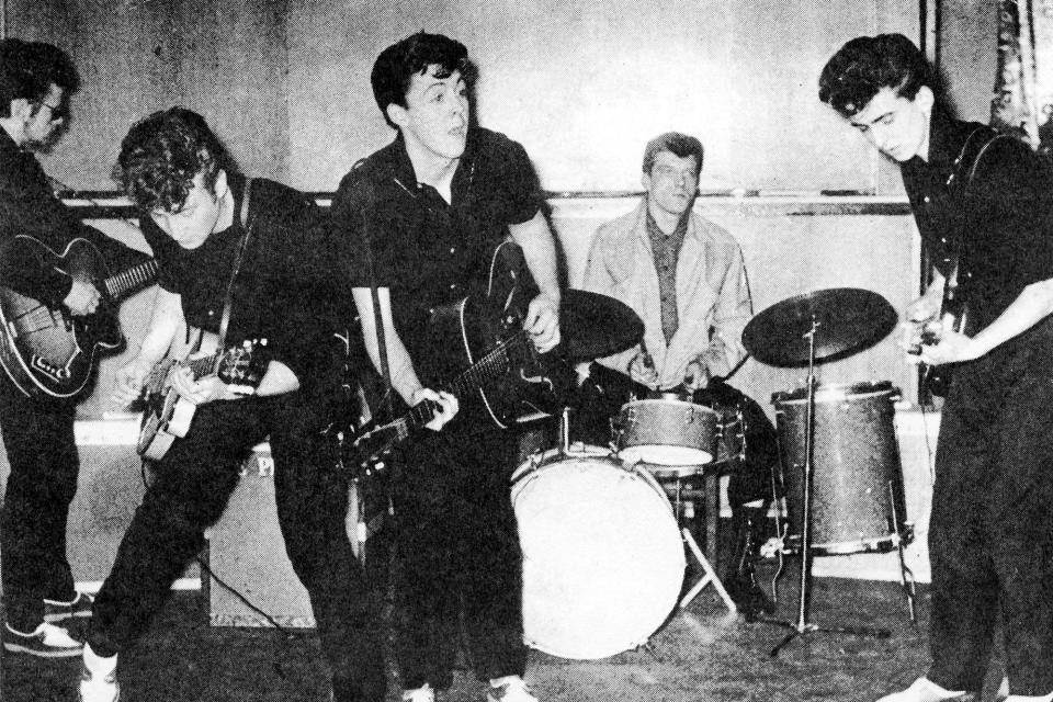 <p>Rocking out with the Silver Beatles — an early version of the band — in Liverpool in 1960. The group included future Beatles John Lennon (left) and George Harrison (right).</p>