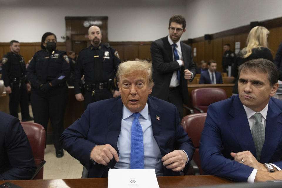 Former President Donald Trump appears at Manhattan criminal court before his trial in New York, Friday, April 26, 2024. (Jeenah Moon/Pool Photo via AP)