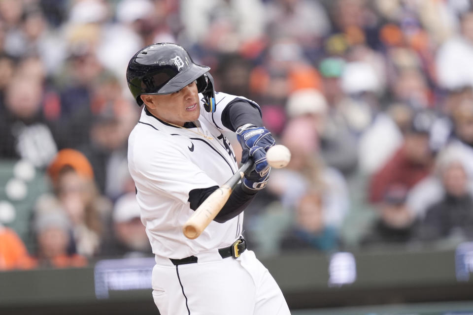Detroit Tigers' Gio Urshela connects for a RBI double during the eighth inning of a baseball game against the Oakland Athletics, Friday, April 5, 2024, in Detroit. (AP Photo/Carlos Osorio)