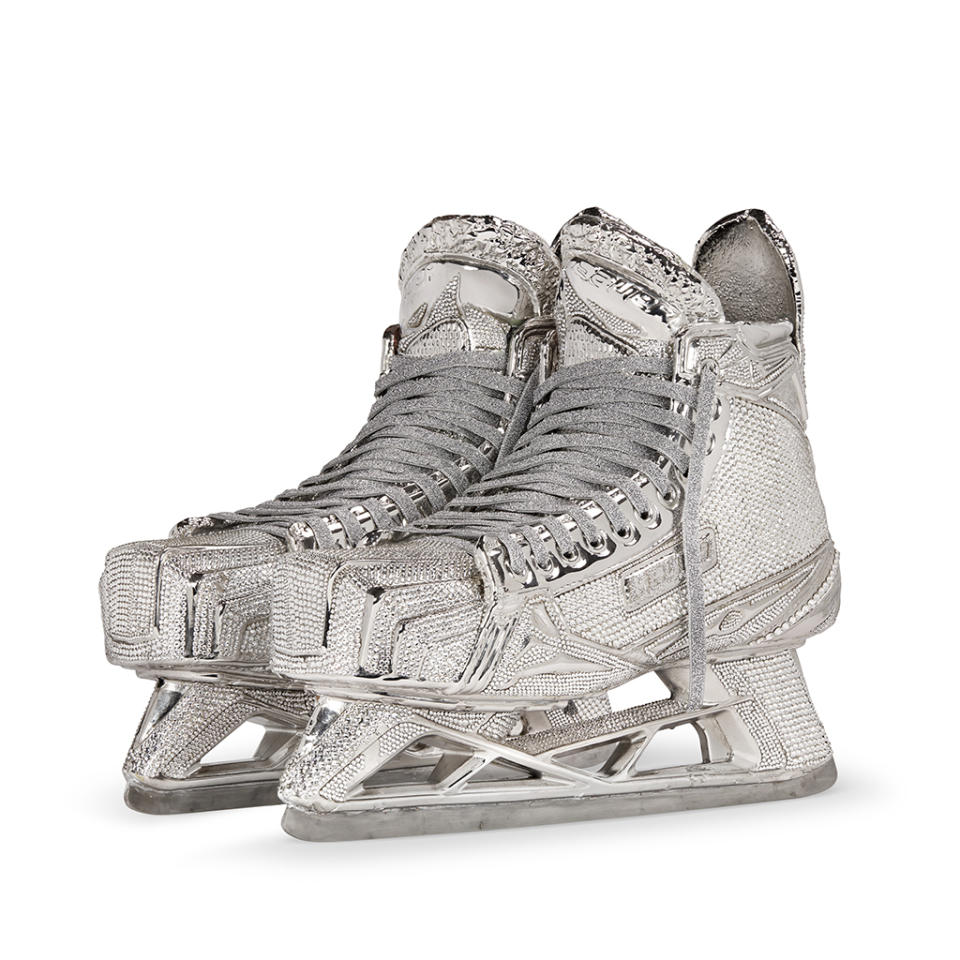 Henrik Lundqvist game-worn and signed skates in chromed copper and nickel bejeweled with Swarovski crystals. - Credit: CHRISTIE'S IMAGES LTD. 2022