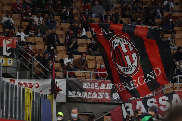 A fan waves a giant flag during the Serie A 2021/22 football match between AC Milan and Venezia FC at Giuseppe Meazza Stadium, Milan, Italy on September 22, 2021 (Photo by Fabrizio Carabelli/LiveMedia/NurPhoto via Getty Images) (Photo: NurPhoto via Getty Images)