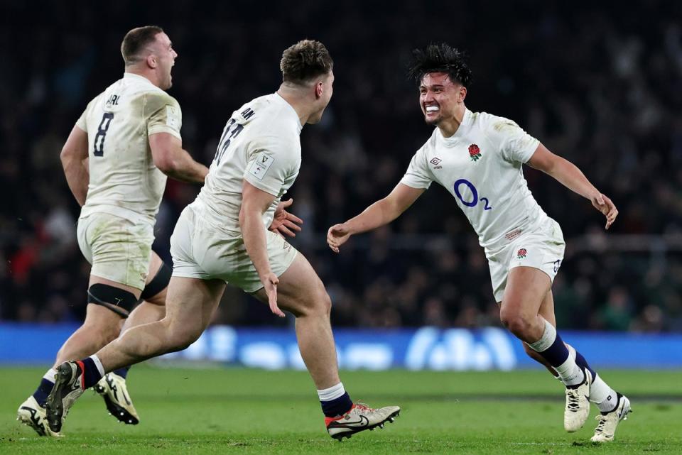 Marcus Smith, right, celebrates his match-winning kick (Getty Images)