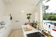 <p>The bar area which opens to the pool of the property is well stocked with a variety of spirits!</p>