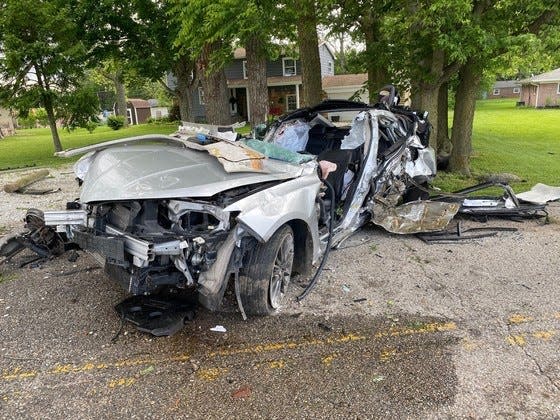 A man, reportedly from Muncie, was critically injured Tuesday morning when a stolen car he was fleeing from police in crashed into trees in Greenfield.