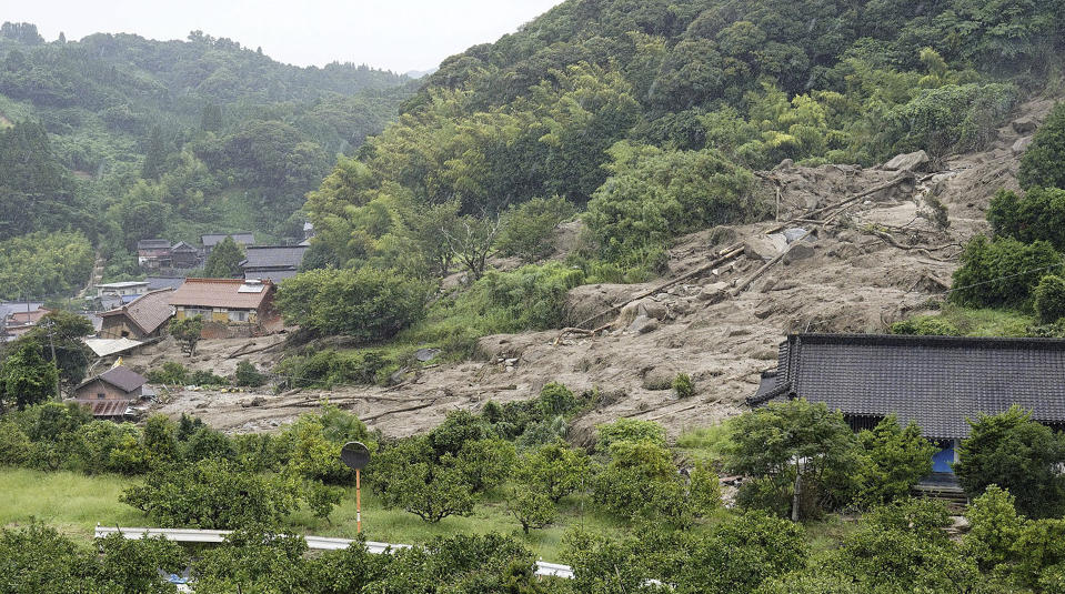 This shows the site of a landslide in Karatsu, Saga prefecture, southern Japan Monday, July 10, 2023. Torrential rain has been pounding southwestern Japan, triggering floods and mudslides. (Kyodo News via AP)