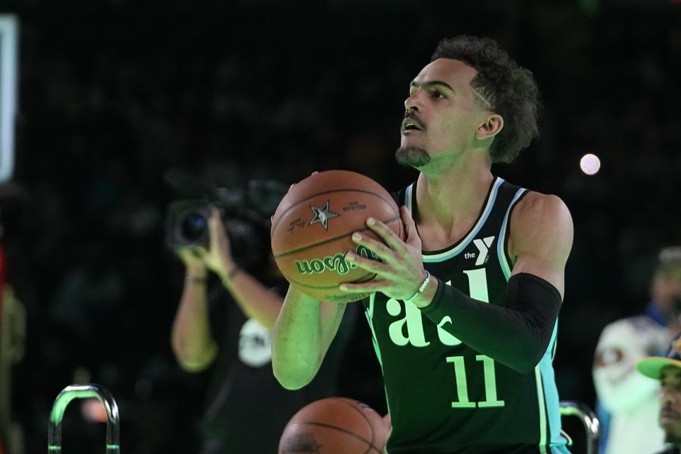 Atlanta Hawks' Trae Young shoots during the 3-point contest at the NBA basketball All-Star weekend, Saturday, Feb. 17, 2024, in Indianapolis. (AP Photo/Darron Cummings)