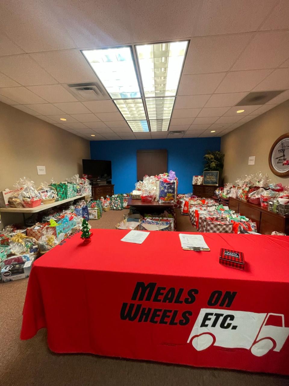 Meals on Wheels, Etc. distribute gift baskets and donations through the Adopt-A-Senior for the Holiday program.