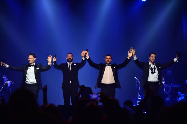 <p>Johnny Louis/Getty</p> Il Divo performing in February 2022 in Miami, Florida