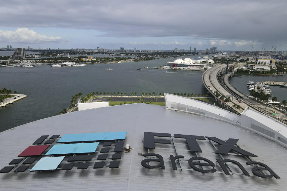 FILE - In this photo taken with a drone, the FTX logo is seen on the roof of the FTX Arena, where the Miami Heat NBA basketball team play, Wednesday, Dec. 7, 2022, in downtown Miami. FTX says that nearly all of its customers will receive the money back that they are owed, two years after the cryptocurrency exchange imploded, and some will get more than that. FTX said in a court filing late Tuesday, May 7, 2024, that it owes about $11.2 billion to its creditors. The exchange estimates that it has between $14.5 billion and $16.3 billion to distribute to them. (AP Photo/Rebecca Blackwell, File)