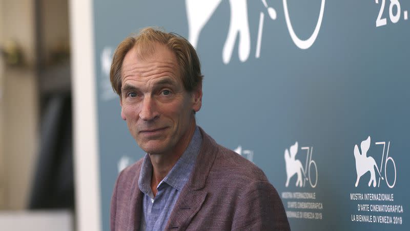 Actor Julian Sands poses for photographers at the Venice Film Festival. Remains  have been found in an area where Sands was hiking when he went missing in January, according to reports.