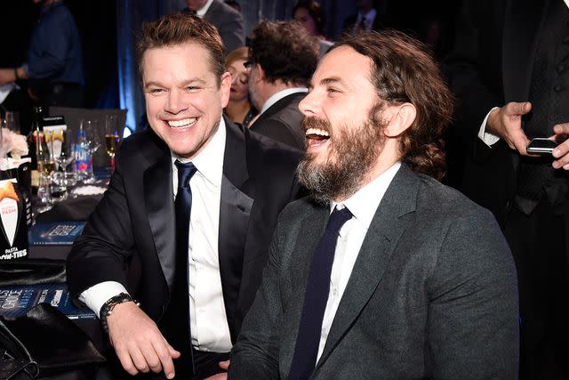 <p>Kevin Mazur/WireImage</p> Matt Damon (left) and Casey Affleck on Dec. 11, 2016