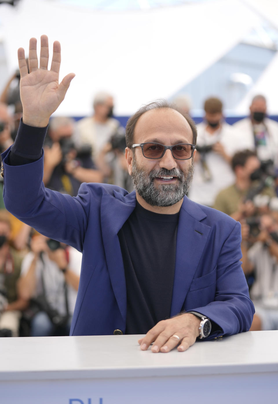 Director Asghar Farhadi poses for photographers at the photo call for the film 'A Hero' at the 74th international film festival, Cannes, southern France, Wednesday, July 14, 2021. (AP Photo/Vadim Ghirda)