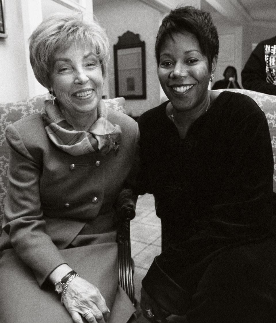 Barbara Henry reunites with her former first-grade student Ruby Bridges in 1998. Bridges was the only student in Henry’s class in 1960, and neither missed a day of school all year.