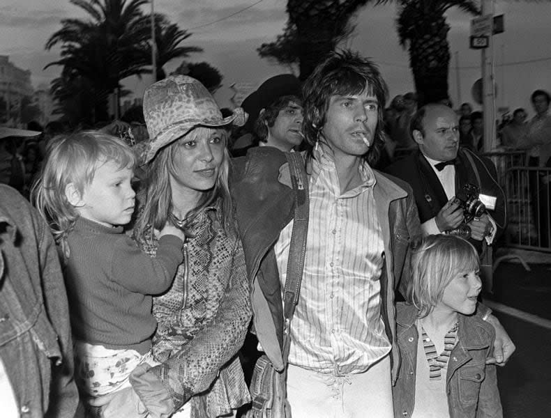 Cannes, France, 21st May 1971: Keith Richards of British rock group 'The Rolling Stones' pictured with his wife Anita Pallenberg and their two children at the Cannes Film Festival. See more exclusive photos like this in the ebook, 