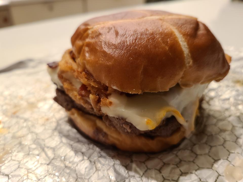 wendys pretzel bacon pub double cheeseburger on white wrapper