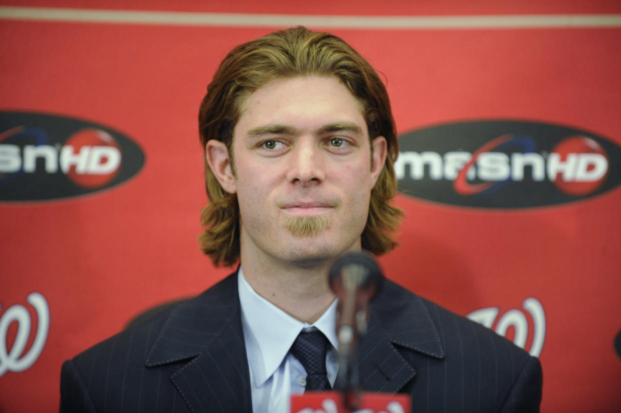 Jayson Werth sported his best Congressman look during his first press conference with the Nationals. (Getty Images)