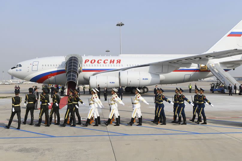 Chinese honour guards march to welcome Russia&apos;s President Vladimir Putin on his arrival at Beijing Capital International Airport.