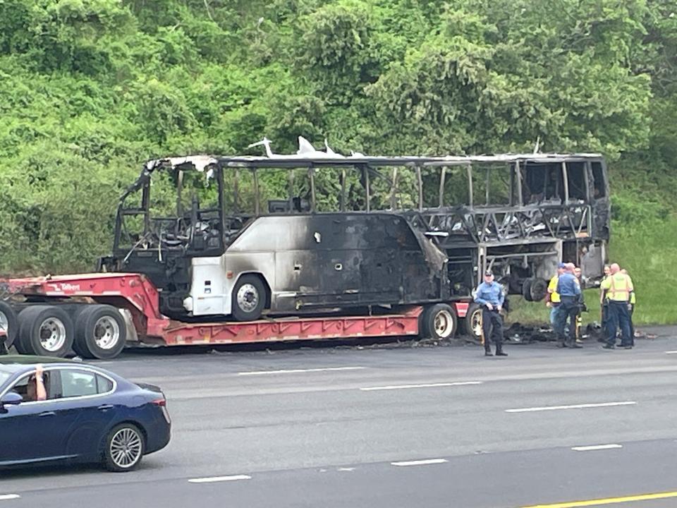 A passenger bus caught fire on the Garden State Parkway southbound lanes near mile marker 99 in Wall Township on Saturday morning. One passenger suffered minor injures while the incident backed up traffic on the parkway for miles.